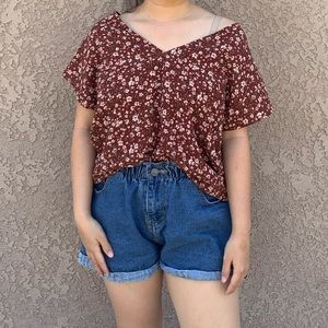 Red floral blouse